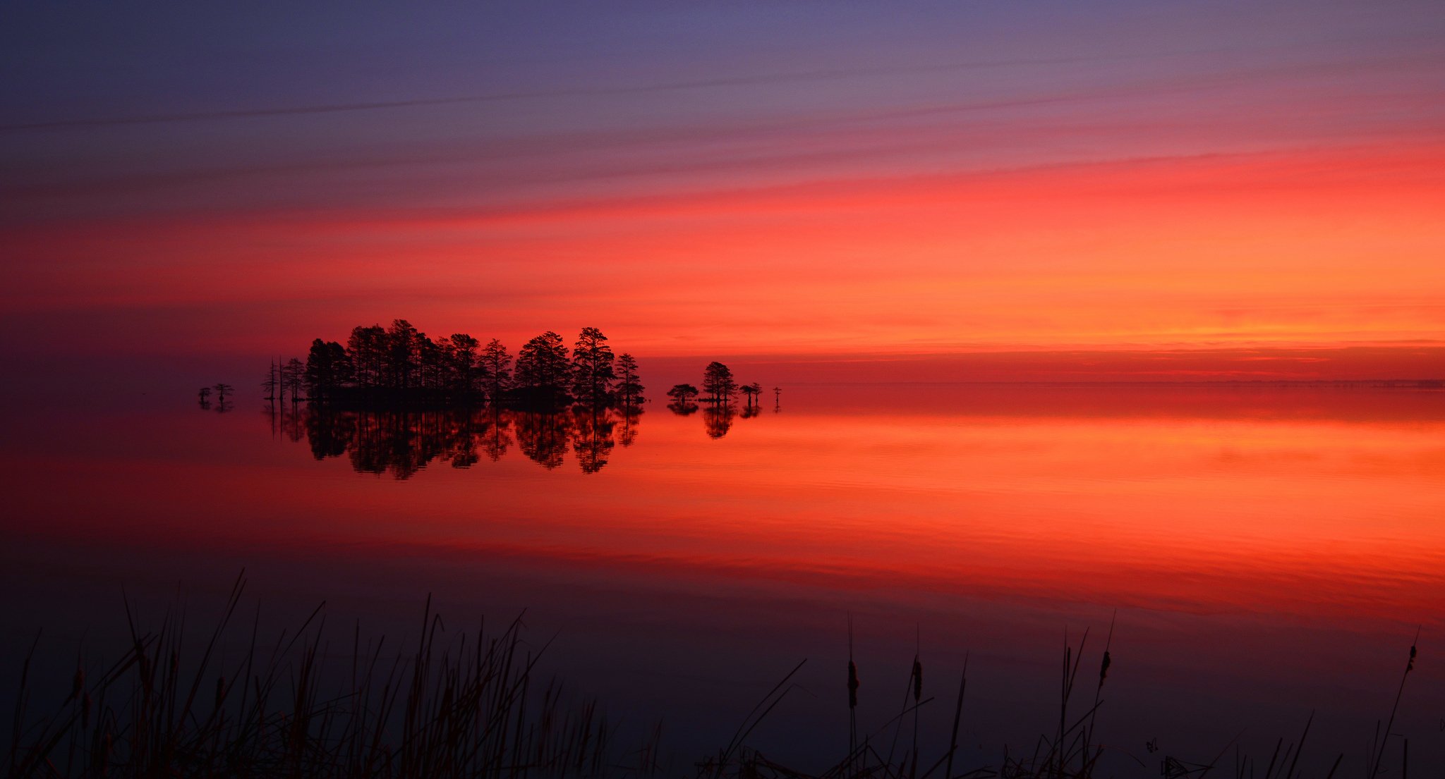 ky clouds sunset glow lake island tree