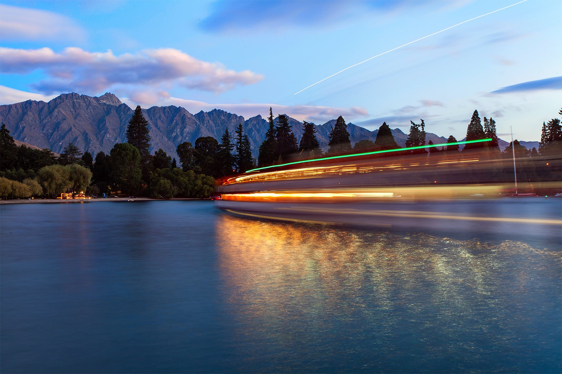 new zealand queenstown water mountain night extract light boat