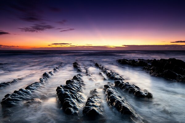 Paesaggio Alba rocce sabbia