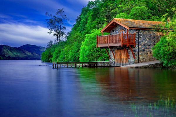 Stone house by quiet water