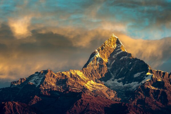 Image of mountain ranges in the morning, Himalayas against a cloudy sky