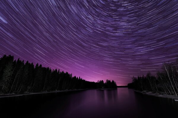 Night starry sky over the river