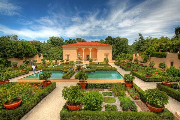 Hamilton Gardens in New Zealand. Flower beds and lawn