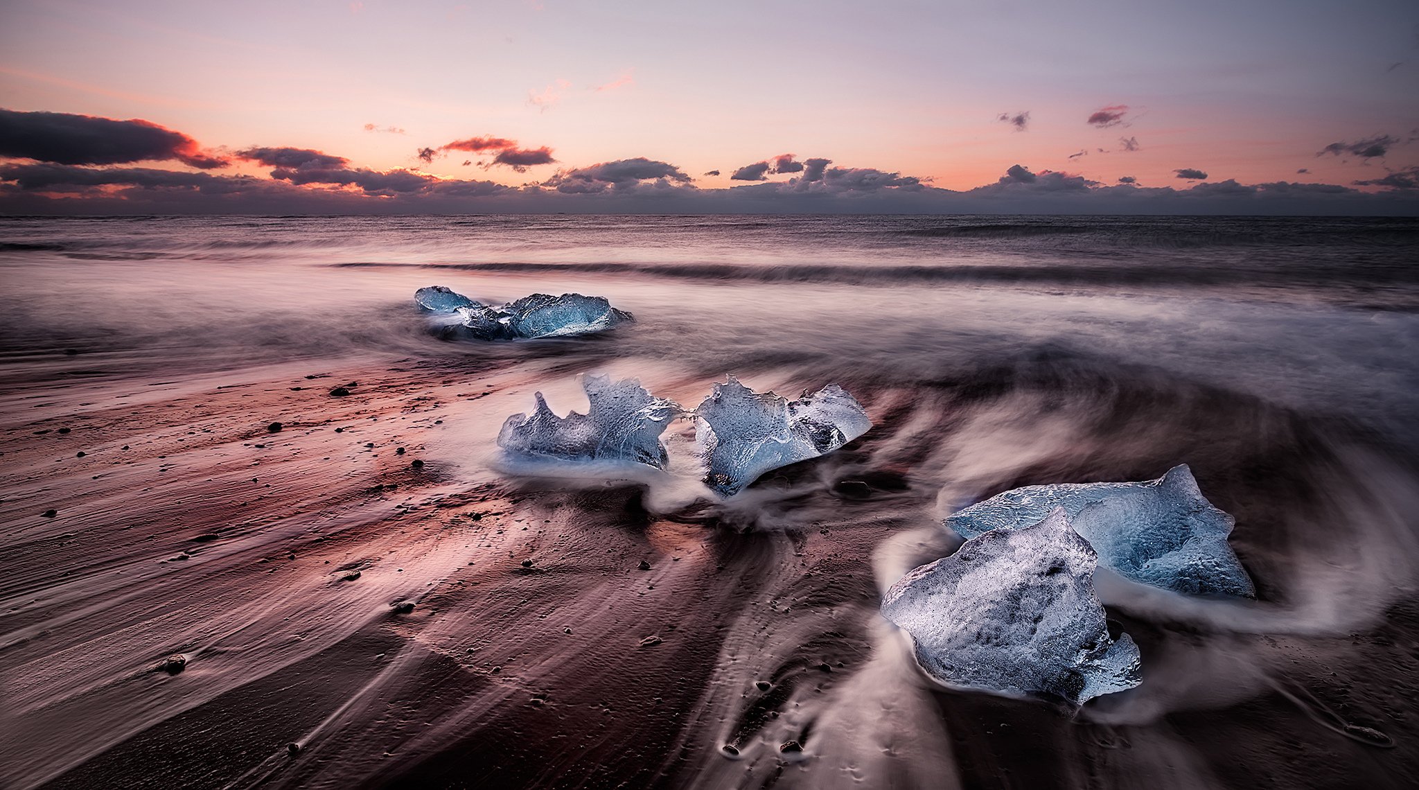 mar playa témpanos de hielo puesta de sol