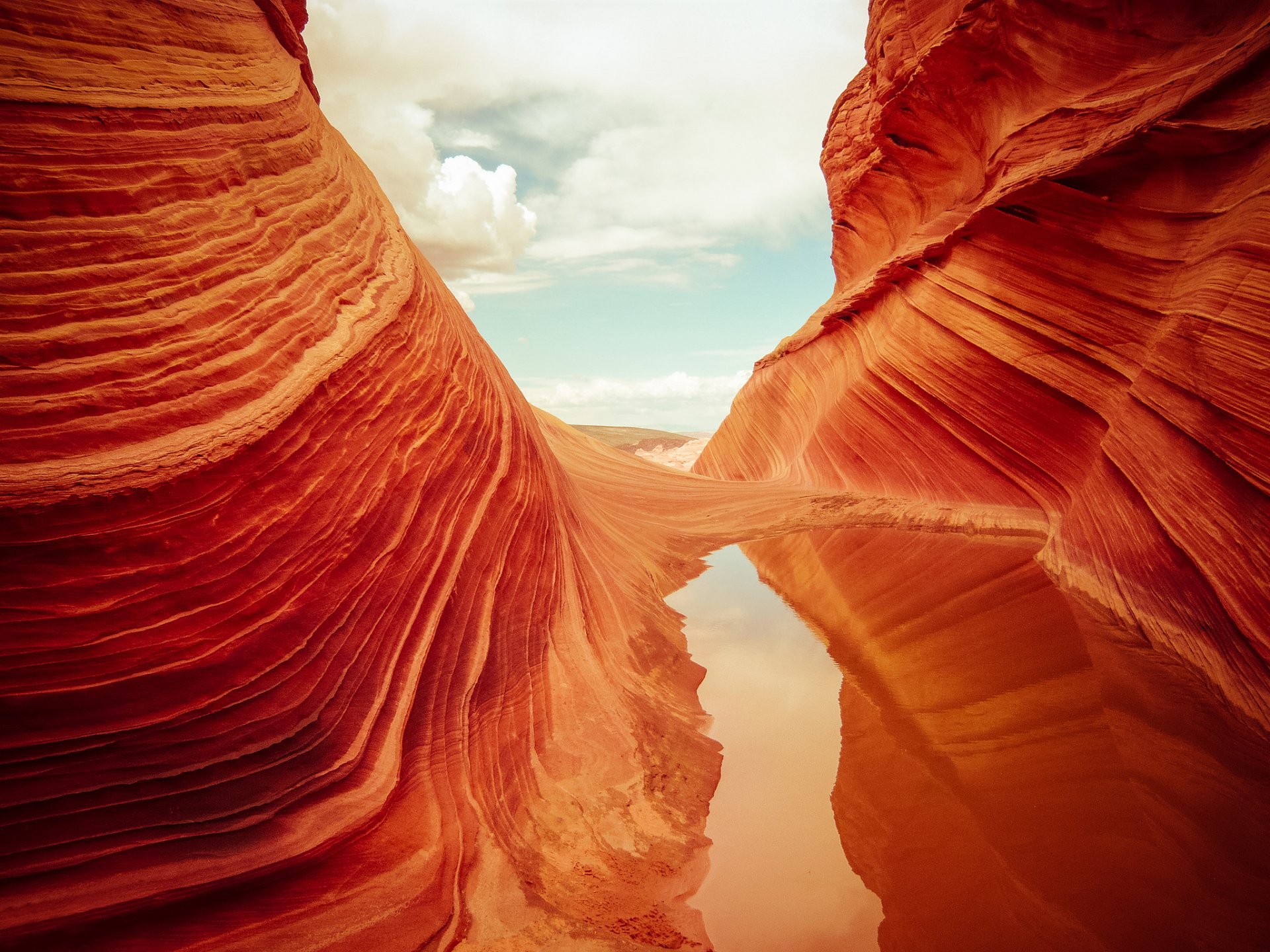 united states arizona coyote butts vermilion cliffs national park rock waves textures water sky reflection