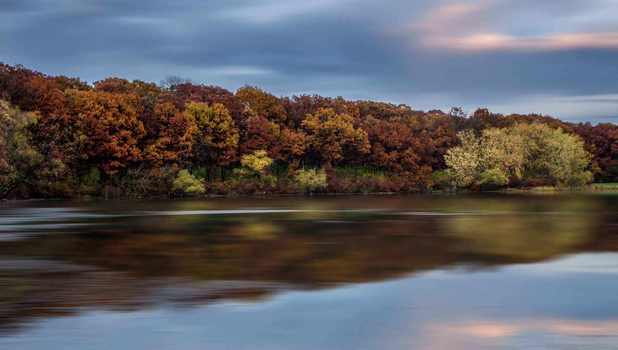 autumn tree river water surface of sky clouds reflection