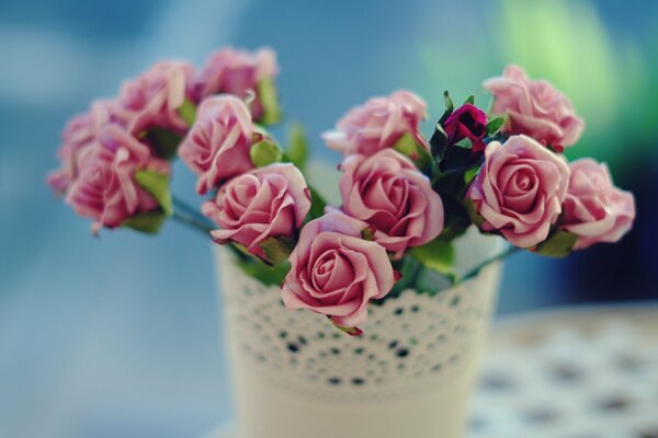 Vase with delicate pink roses