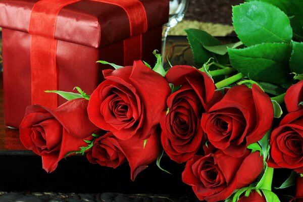Gift box and red roses