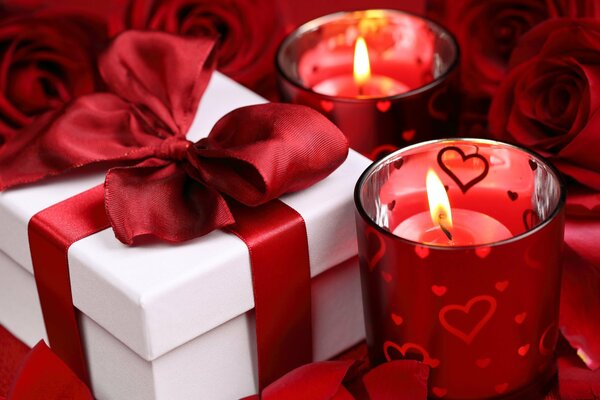 Red candles in the romance of roses