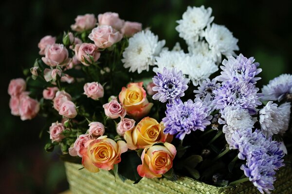 Bouquet of pink and yellow roses and chrysanthemums