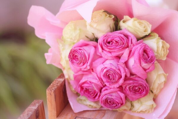 A beautiful bouquet of pink and cream roses
