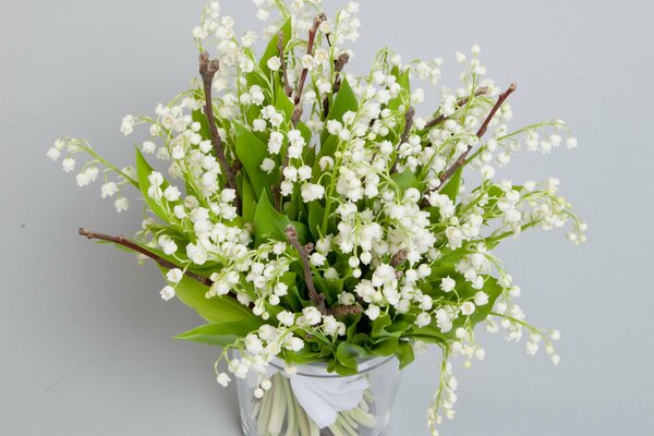 Bouquet of spring lilies of the valley in a vase