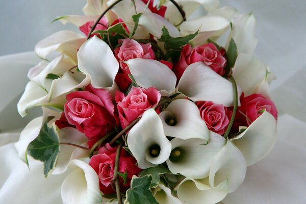 Composition of calla flowers in the form of a bouquet