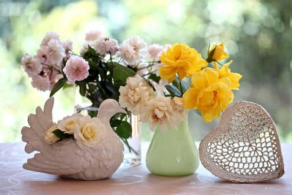 Bouquet of roses with a dove and a heart