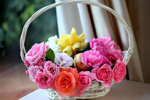 Basket with colorful roses