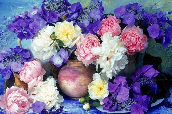 Colorful hydrangeas and peonies in a vase