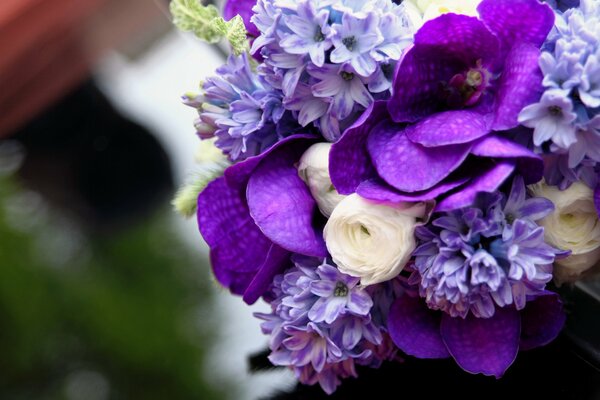 Lilac bouquet of hypcinth, wanda and orchid