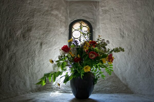 A beautiful bouquet at the vintage window