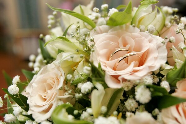 Wedding rings in a wedding bouquet