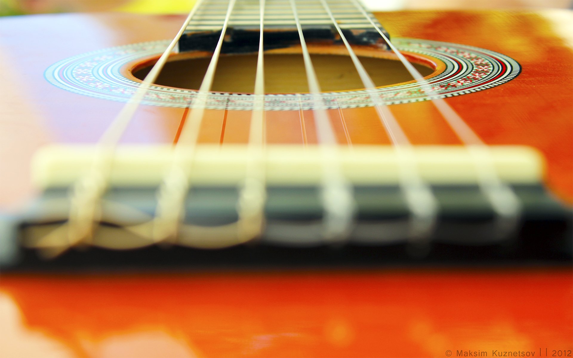 macro guitarra naranja venitomusic