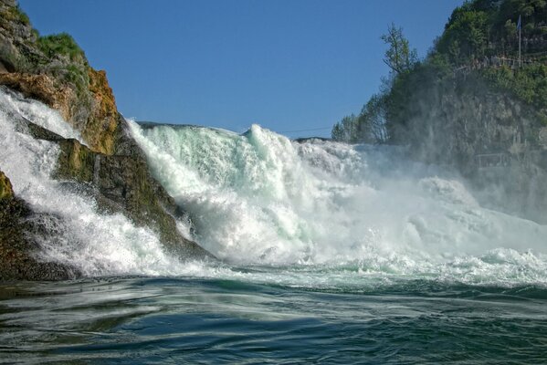 Waterfall flow from the rocks. Switzerland