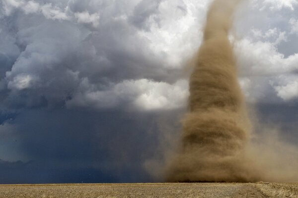 Stormy sky, sand vortex