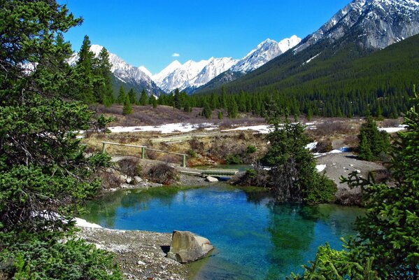 Snow-capped mountain peaks in spring