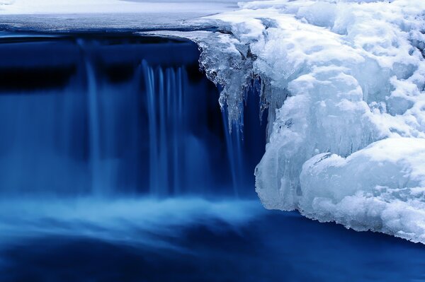 Waterfall with frozen sticking water