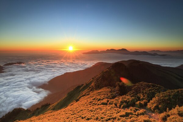 Clouds descending from high hills