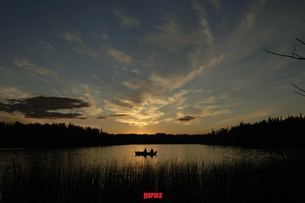 Fishing at dawn by boat