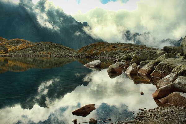 Mountains reflected in a clear lake