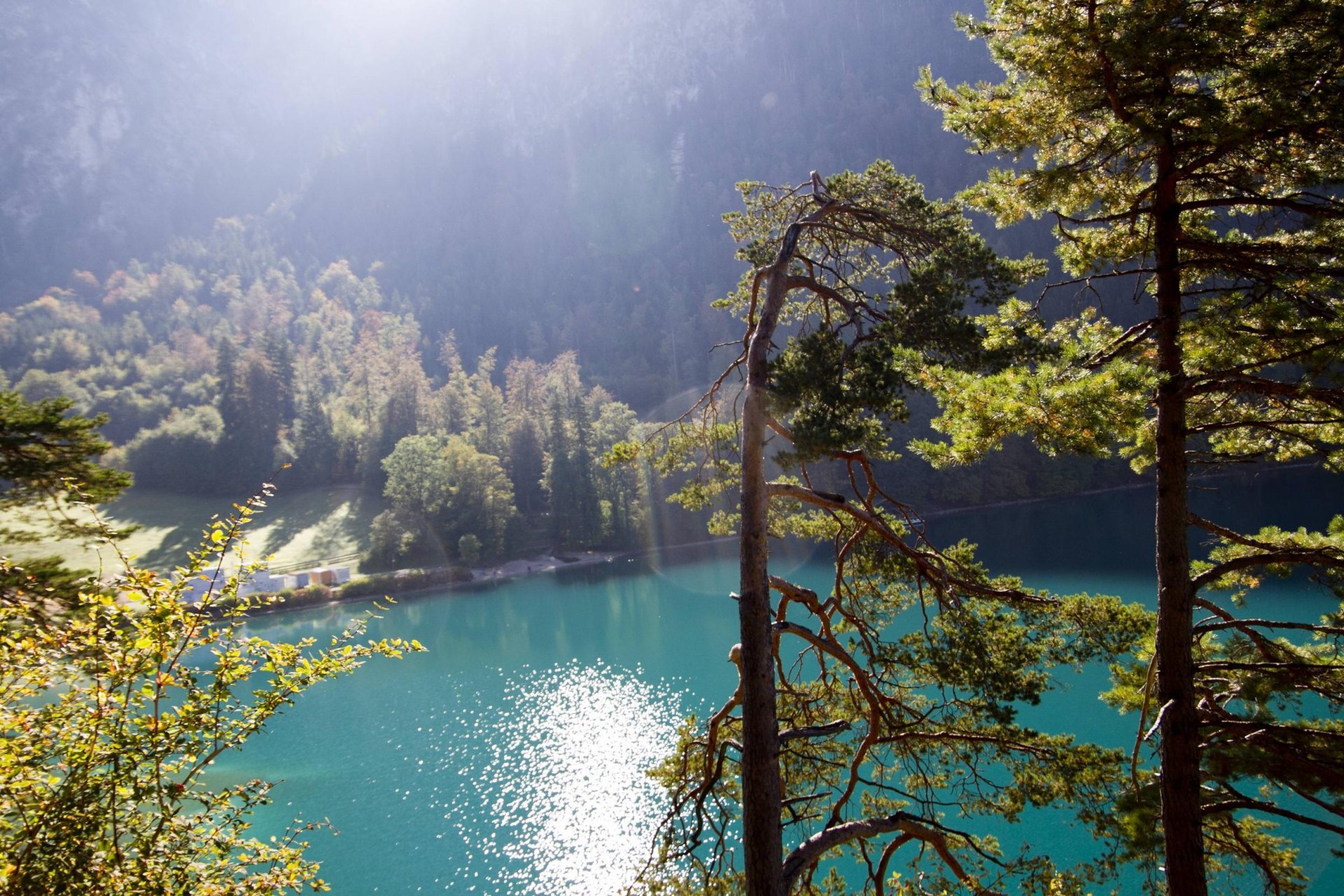 mountain forest lake sun rays nature