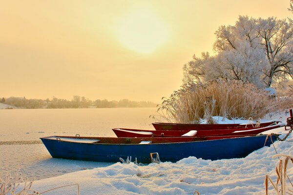 Snow on boats in winter