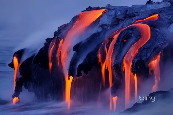 Steam over flowing lava flows