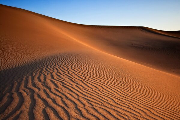 The boundless desert amazes with its power