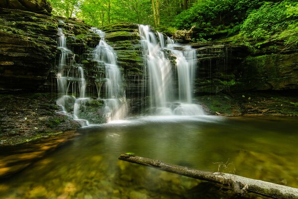 A small mountain waterfall in the forest