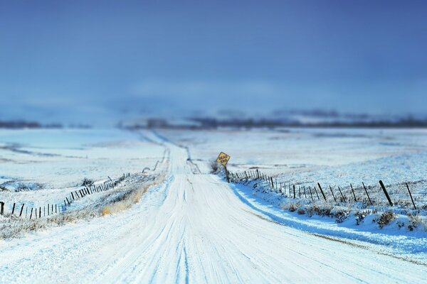 Winter road leading into the distance