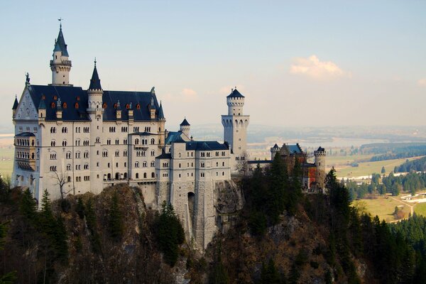 A big beautiful castle on a rock