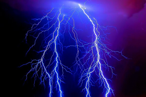 Purple lightning on a dark background