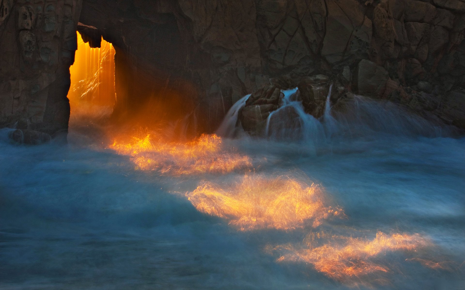 nature rock rocks water shore spray waves rays light sea ocean arch arches stone stones cave cave