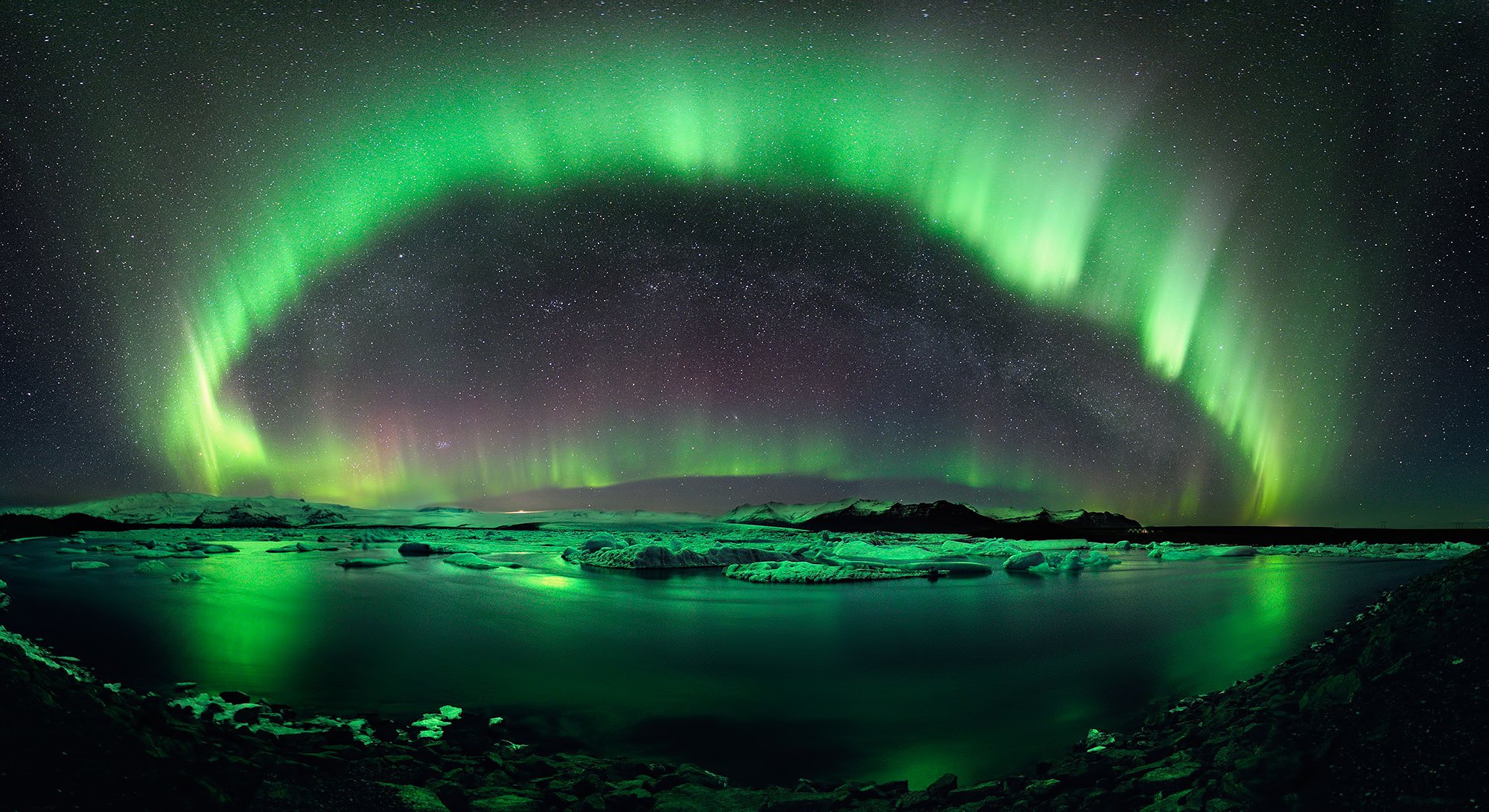 aurora islanda cielo stelle ghiaccio riflessione lago ekülsaurlon