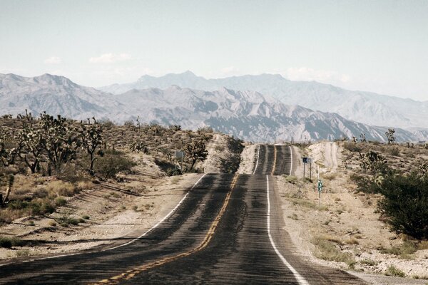 A deserted road in an arid area