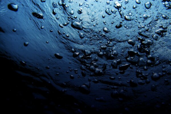 Macro photography of bubbles in the ocean