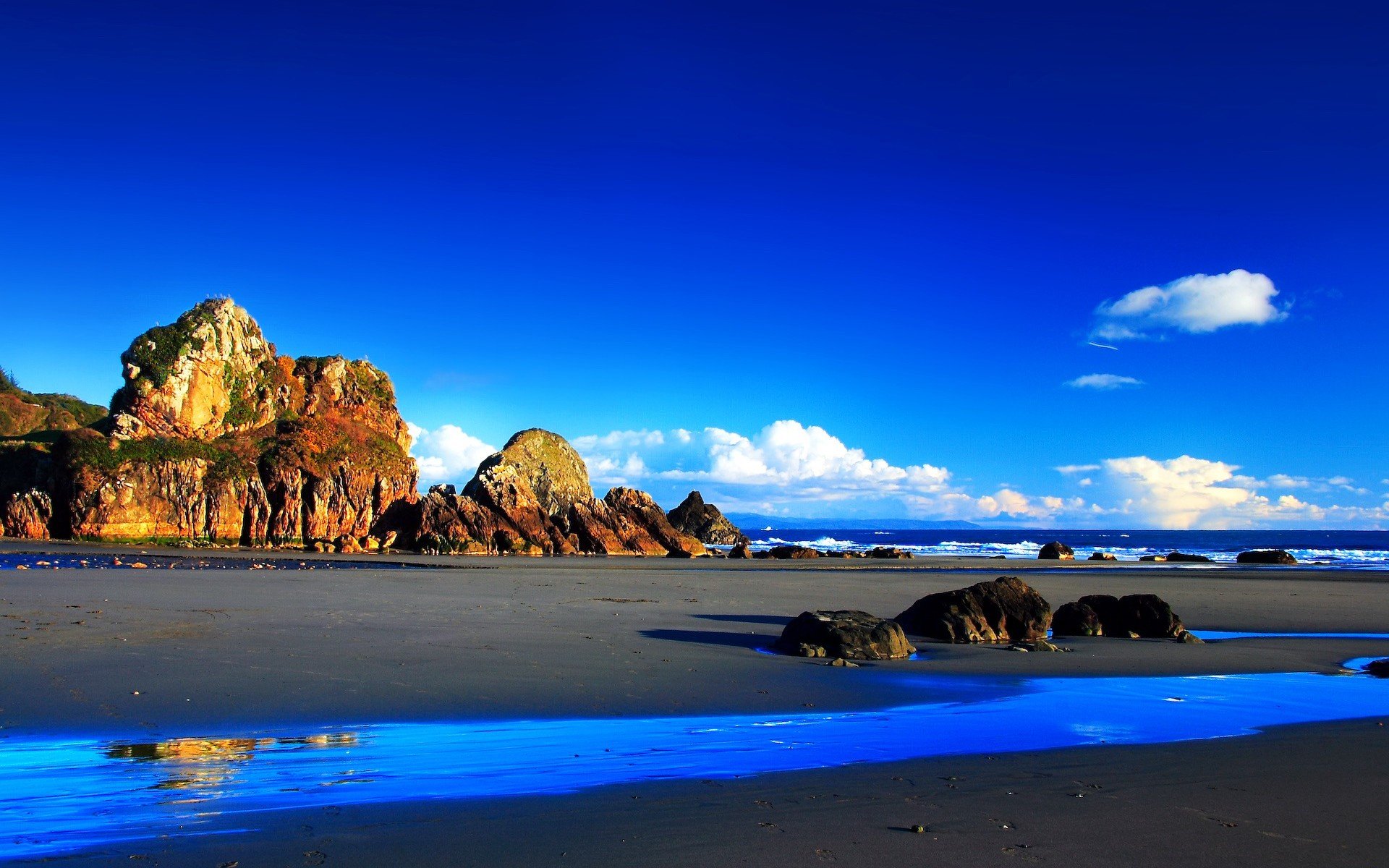 rock stones clouds water beach