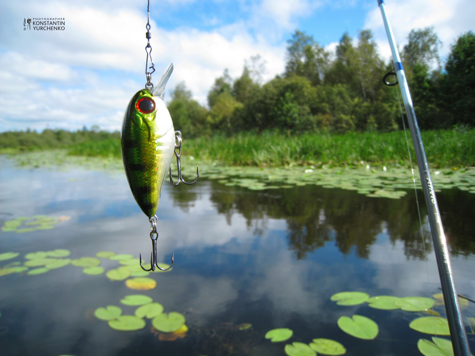 fishing wobbler spinner fishing rod spinning river lake sky water reflection landscape recreation nature