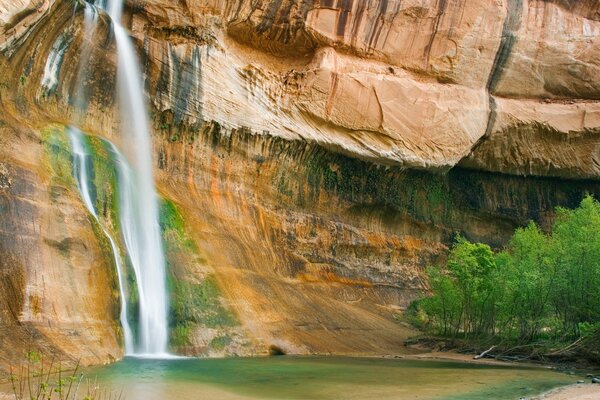 Beautiful photo of a waterfall from a cliff