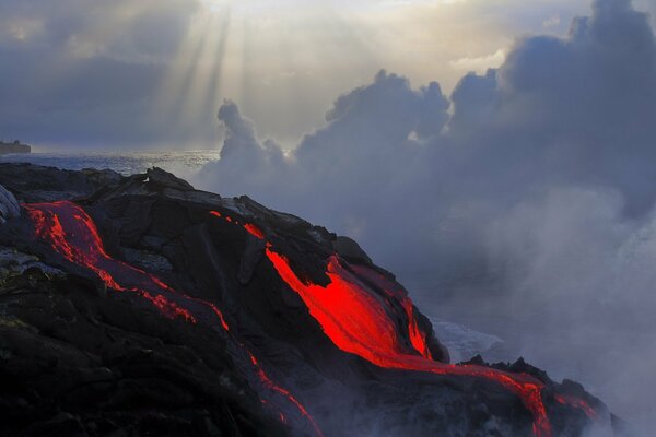 Volcanic eruption. Fiery lava is spreading