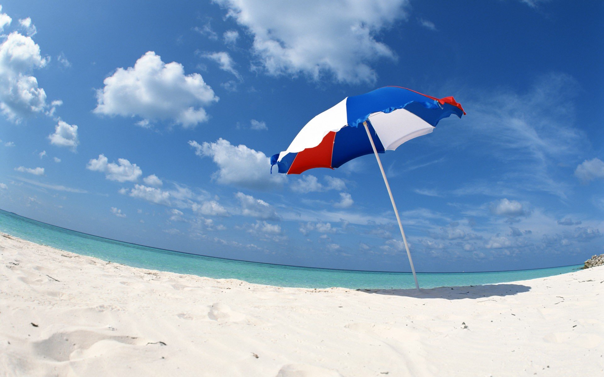 and beach clouds sea umbrella