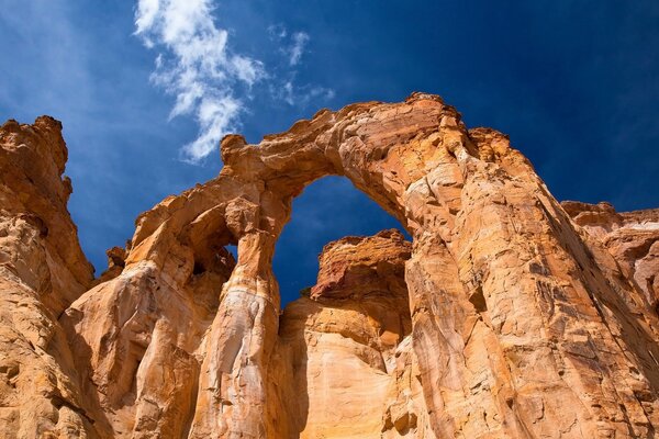 A rock against a blue sky