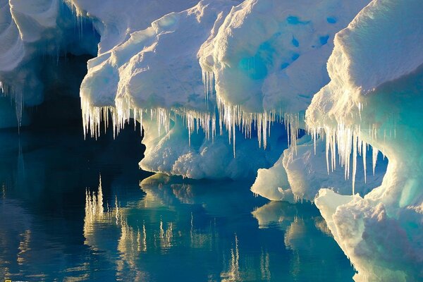 Icebergs are reflected in cold water